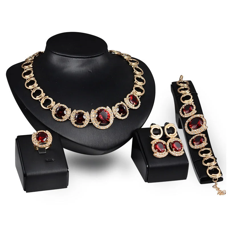 Make Every Moment Shine – Jewelry Discounts Available Opulent Gold Jewelry Set: 4-Piece Blue Gem Wedding & Banquet Collection
