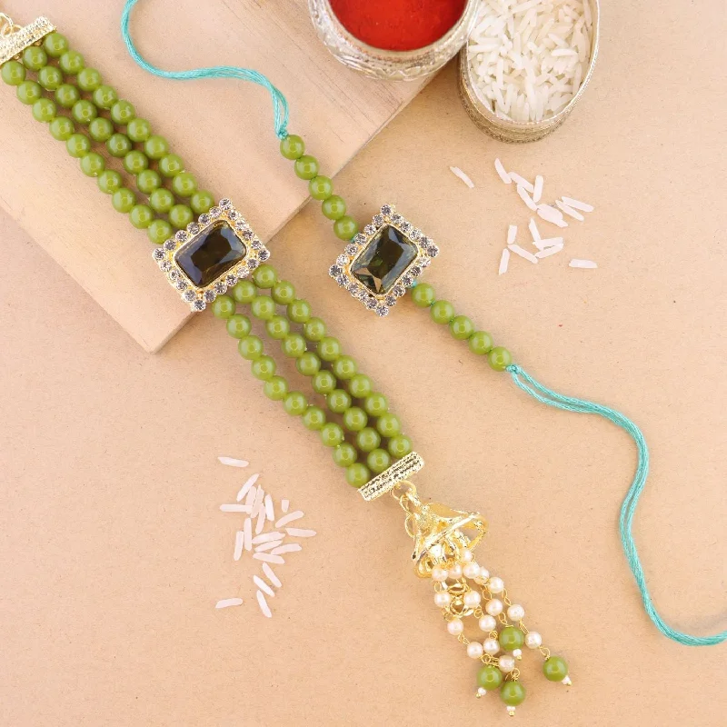 Stunning Jewelry At A Fraction Of The Price Etnico I Jewels Designer Kundan & Pearl Hanging Bhaiya Bhabhi Lumba Rakhi Combo Set with Roli Chawal and Rakshabandhan Card (R010MH-CO)